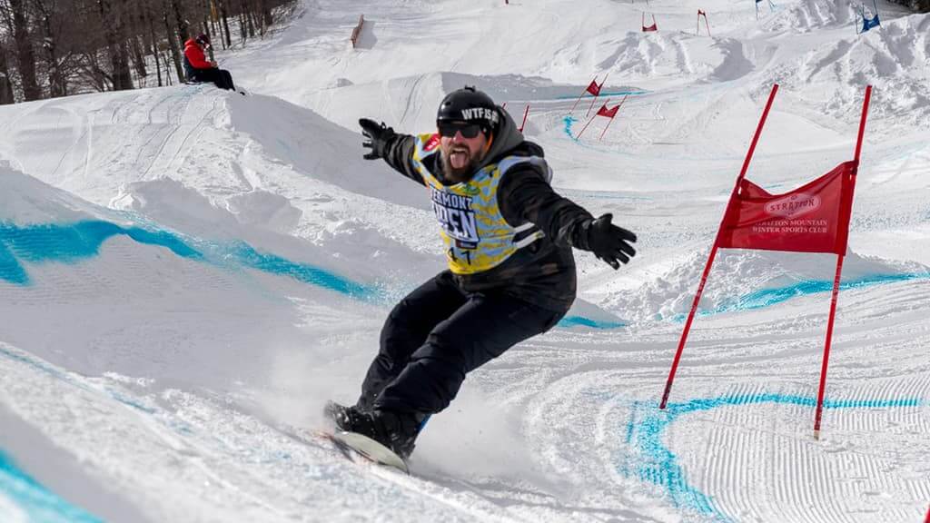Snowboarder taking a turn at the Vermont Open at Stratton