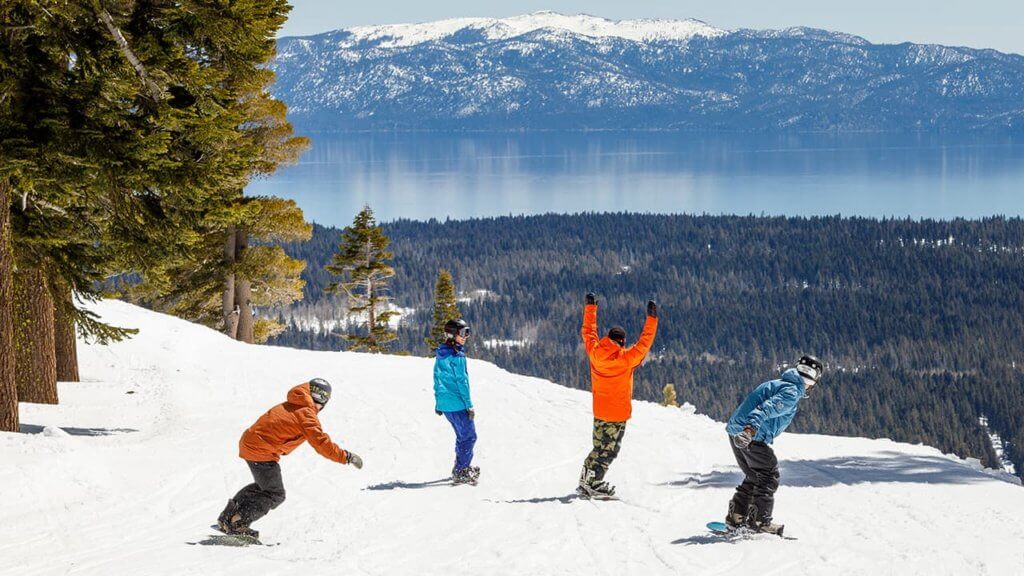 Snowboarders excited to ride the Sherwood Cliffs territory of Squaw Valley Alpine Meadows