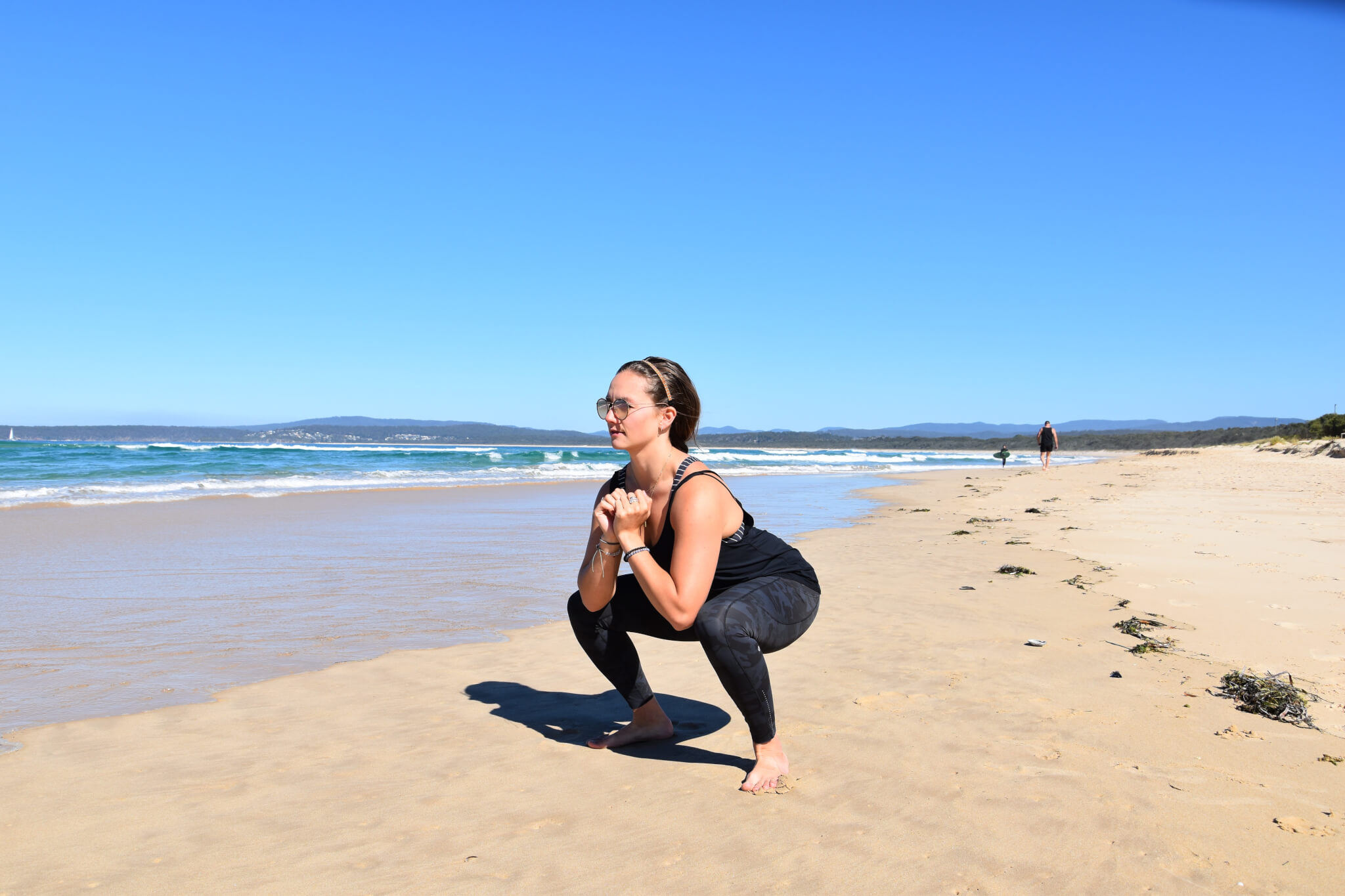 Athlete Whitney Gardner performing a goblet squat, one of the winter training activities recommended to get ready for the season.