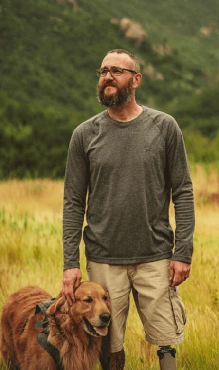 Adaptive athlete Phil “Q” Quintana and his dog