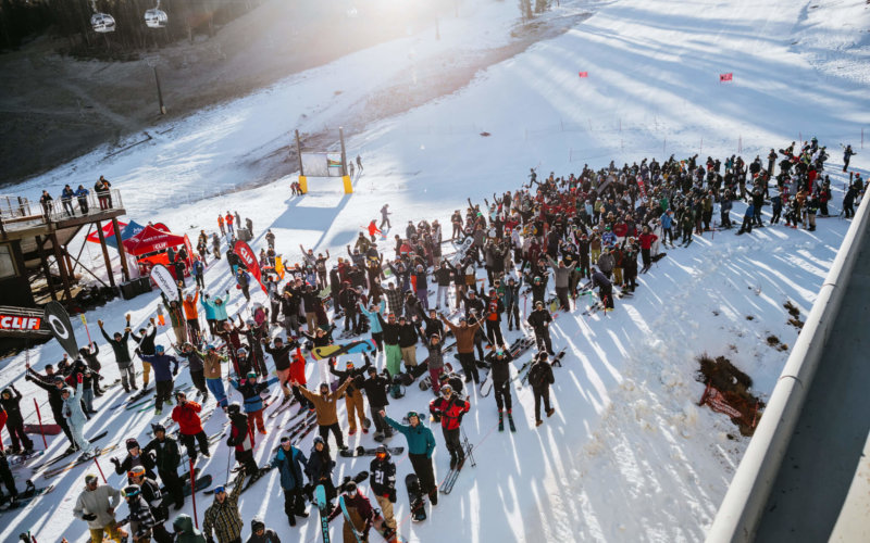 Crowds of people celebrating the opening of Mammoth Mountain for the 19/20 season