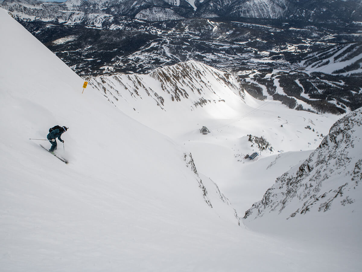 Skiing a steep slope at Big Sky in Montana