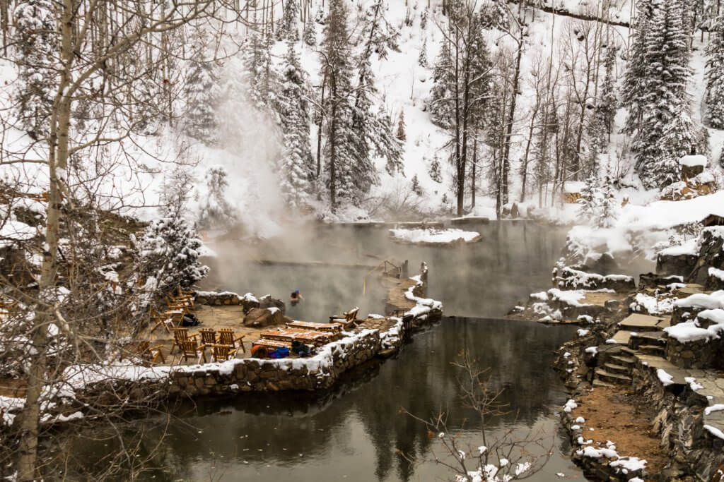 Steam rising from the water at Strawberry Hot Springs in winter outside of Steamboat