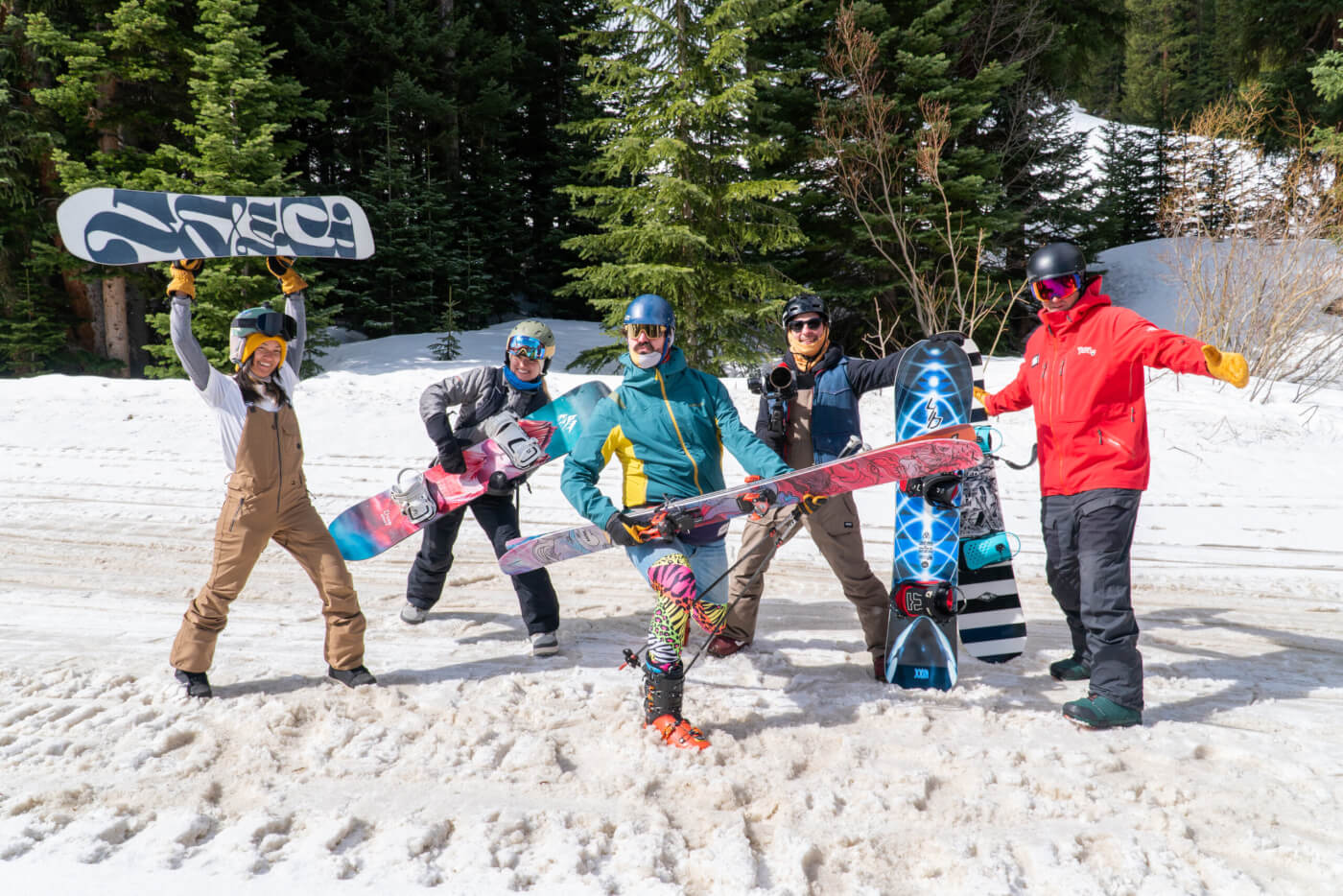 Group of skiers and snowboarders having fun in the snow.