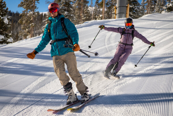 Scholarship recipient skis with Athlete Connor Ryan.