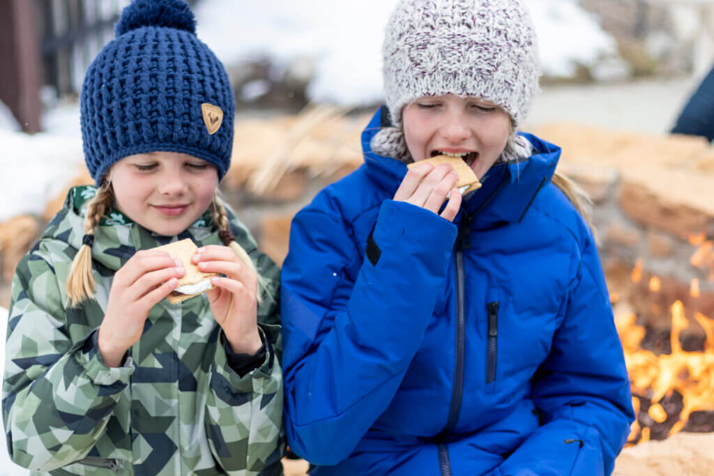 Two kids eating smores.