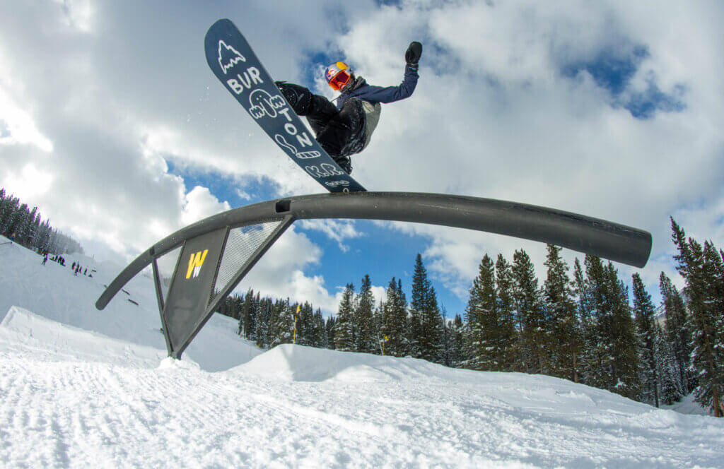 Snowboarder on a rail at Copper Mountain.