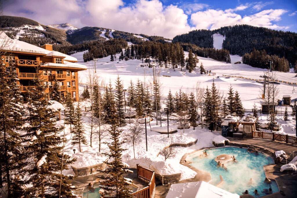 Aerial winter view of pool area at a lodge.