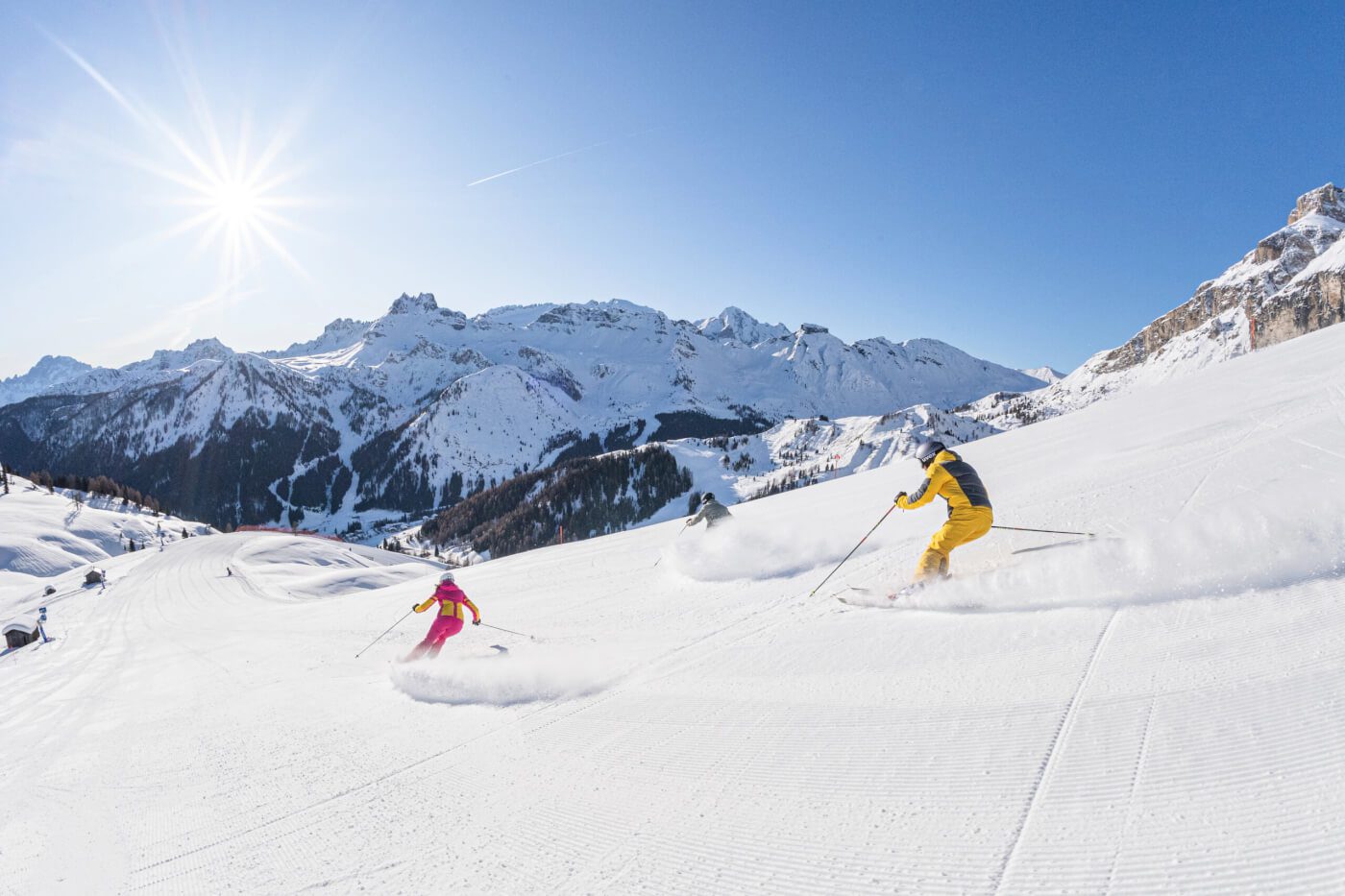 Two skiiers riding at Dolomiti Superski.