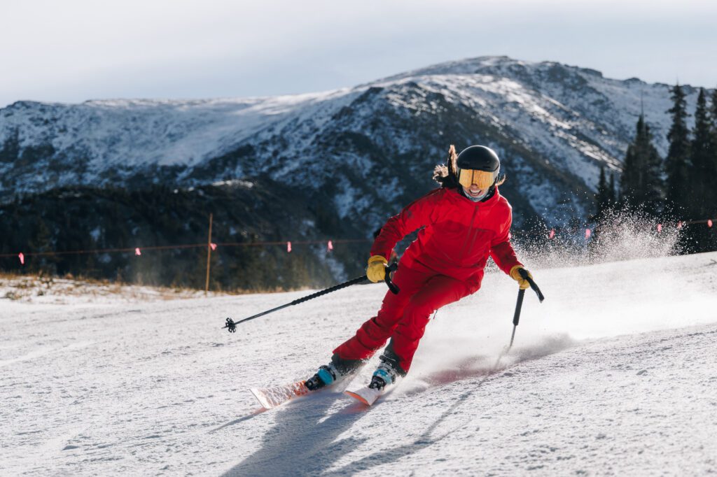 Woman making turns at Arapahoe Basin opening day 2026-2027 season