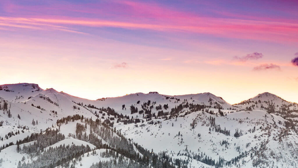 Sunrise over a snowy mountain