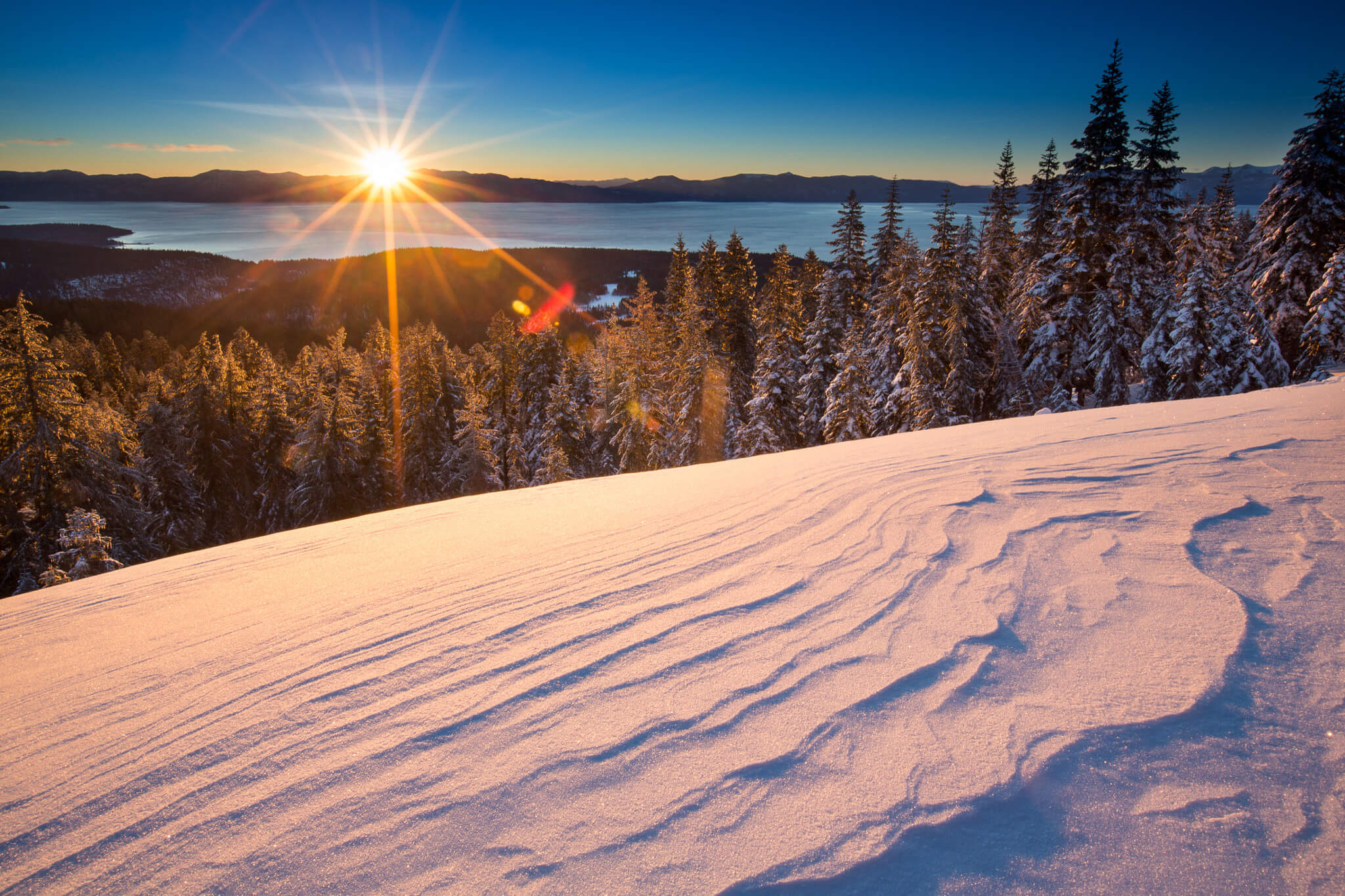 View of the sunset over Lake Tahoe at Alpine Meadows, a perfect selfie spot