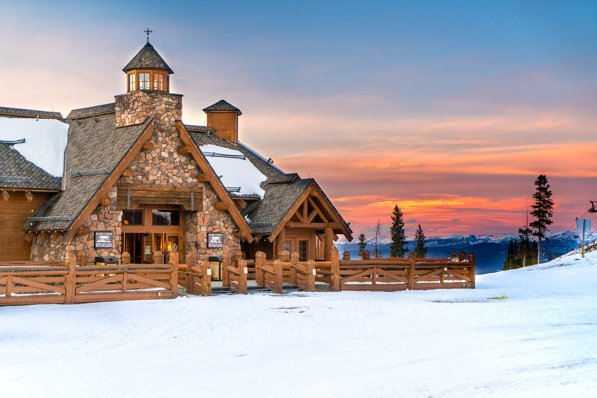Exterior view during sunset of the Lodge at Sunspot at Winter Park Resort