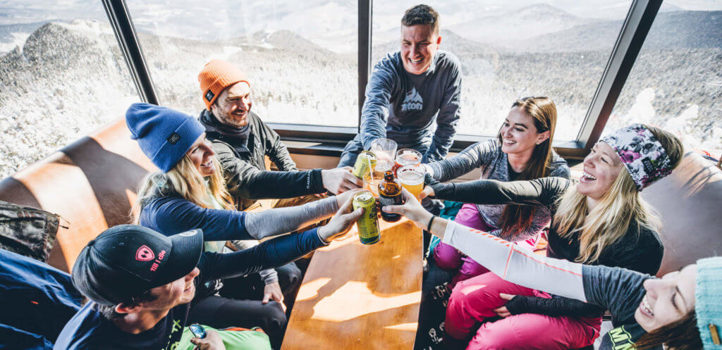 Group of friends toasting to a great day on the mountain at Killington Resort