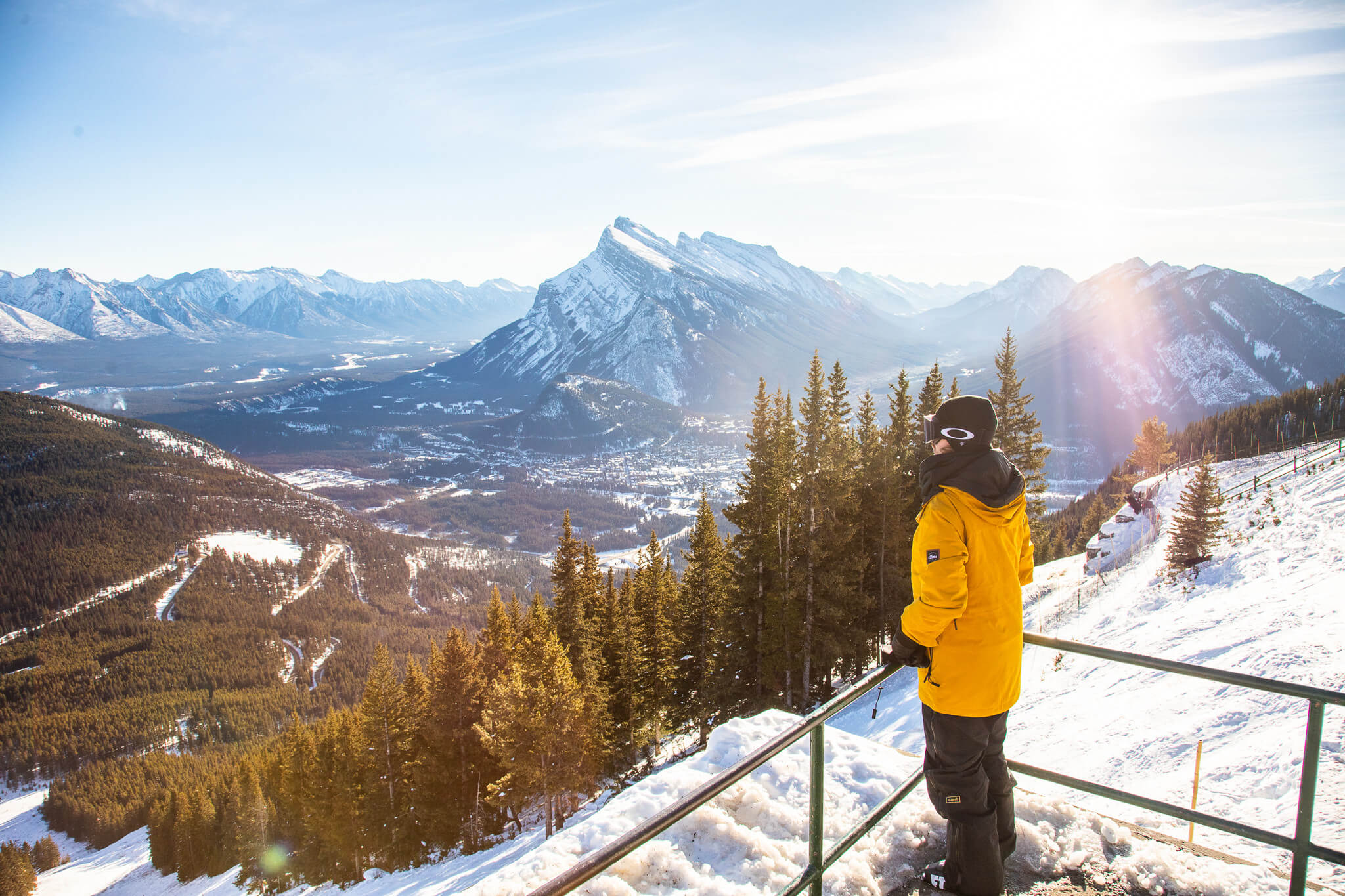 Man taking in the views of Banff National Park from Nt. Norquay, a beautiful selfie spot