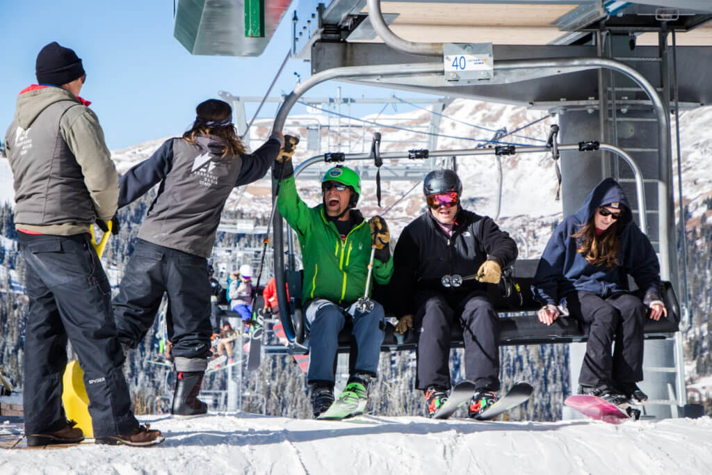 Skiers and snowboarders enjoying opening day at Arapahoe Basin in Colorado