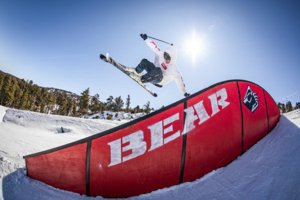 Skier going off a rail in the terrain park at Big Bear Resort